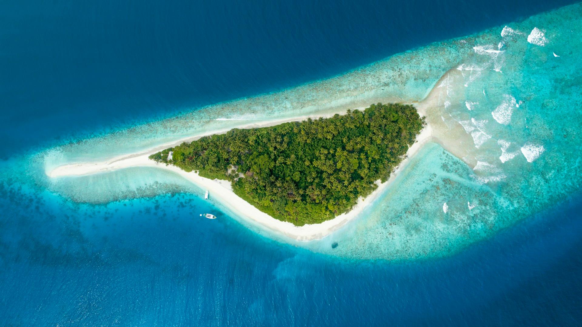 Aerial turquoise water and islands from the Seychelles landing page concept.
